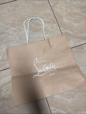 Christian Louboutin tan tote with white logo and rope handles